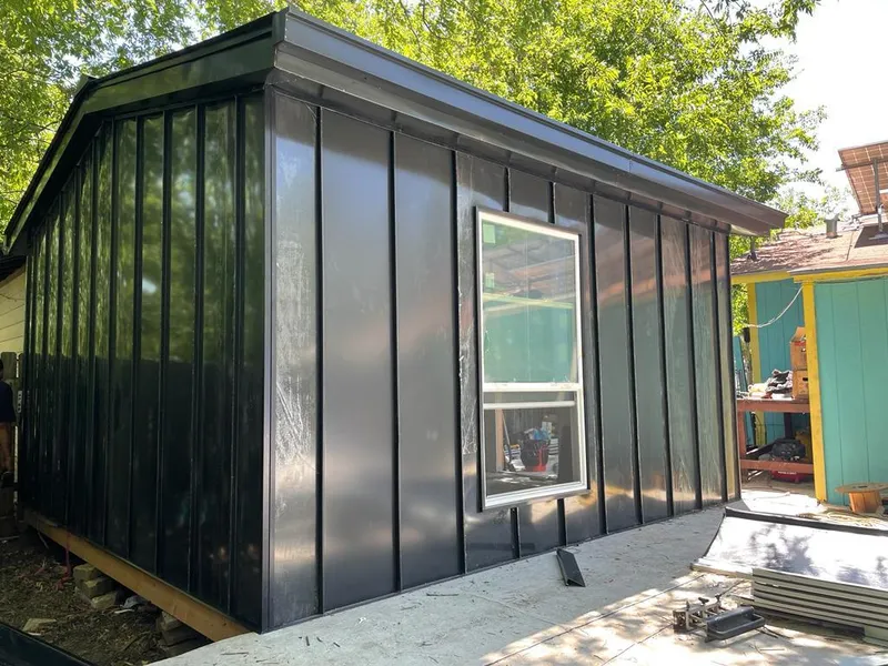 Black standing seam metal wall panels for Metal Roof Installation in Adelphi