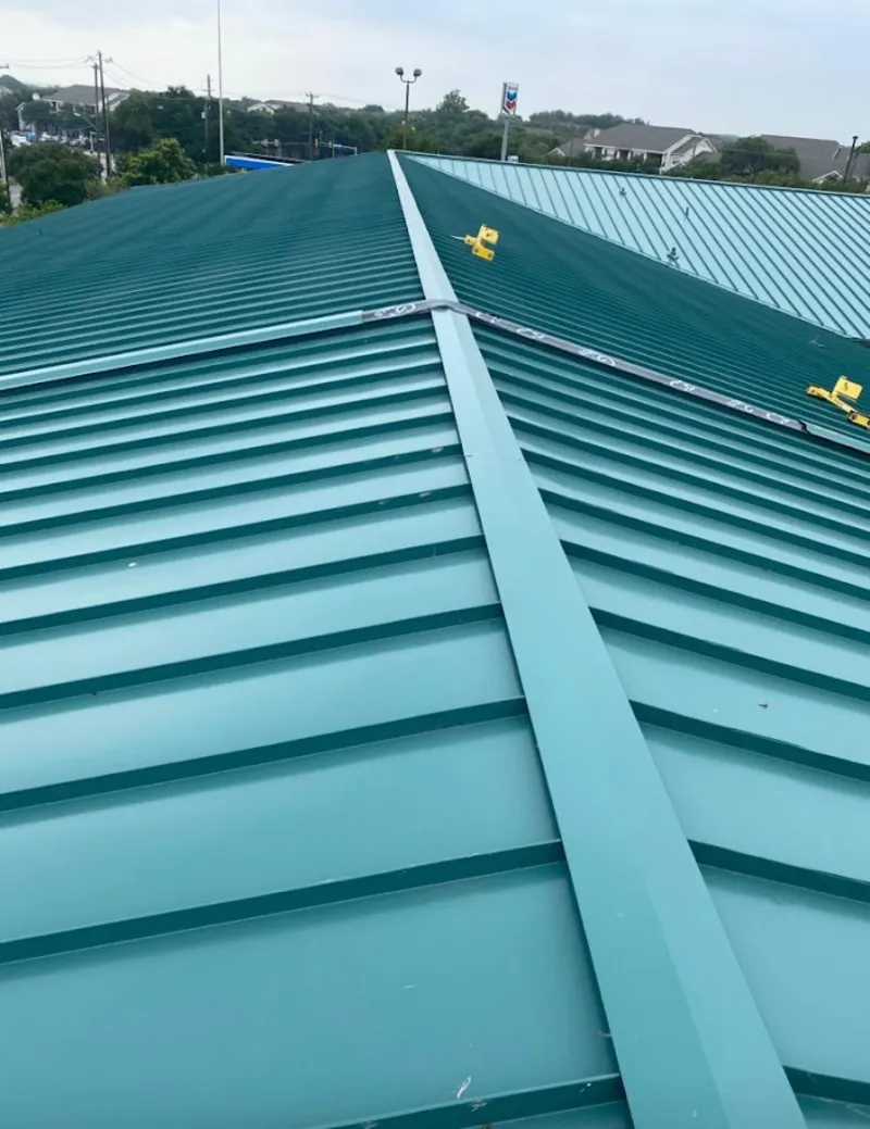 Green commercial metal roof ridge and valley for Metal Roof Repair in Adelphi